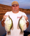 Master Crappie Angler Mike Simpson shows off a more Kansas Slab Crappie caught on Crappie Magic Crappie Tackle