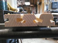 NCM 0209  Trial and error window tracks... On the left, straight cut hoping that router bit would allow enough room to slide plexiglass. Center... 22 1/2* angle cut on track, same bit. Right is finished version of center piece.